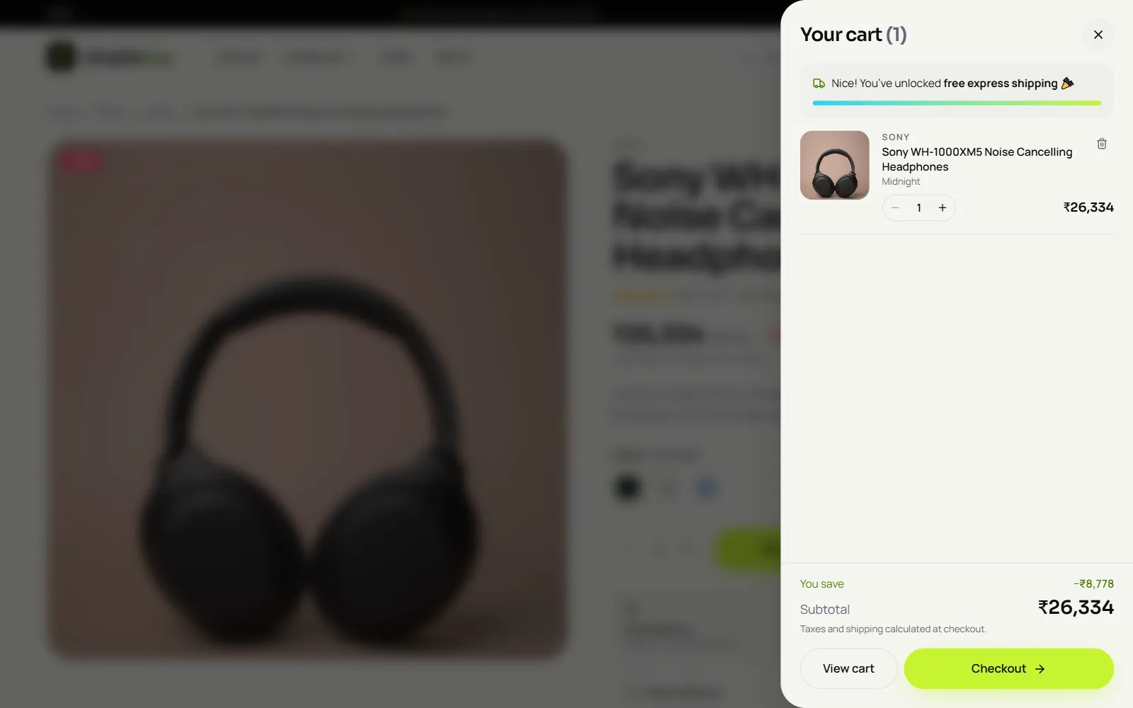 Slide-out shopping cart on an electronics store showing a free express shipping tracker, the chosen headphones, savings and checkout button